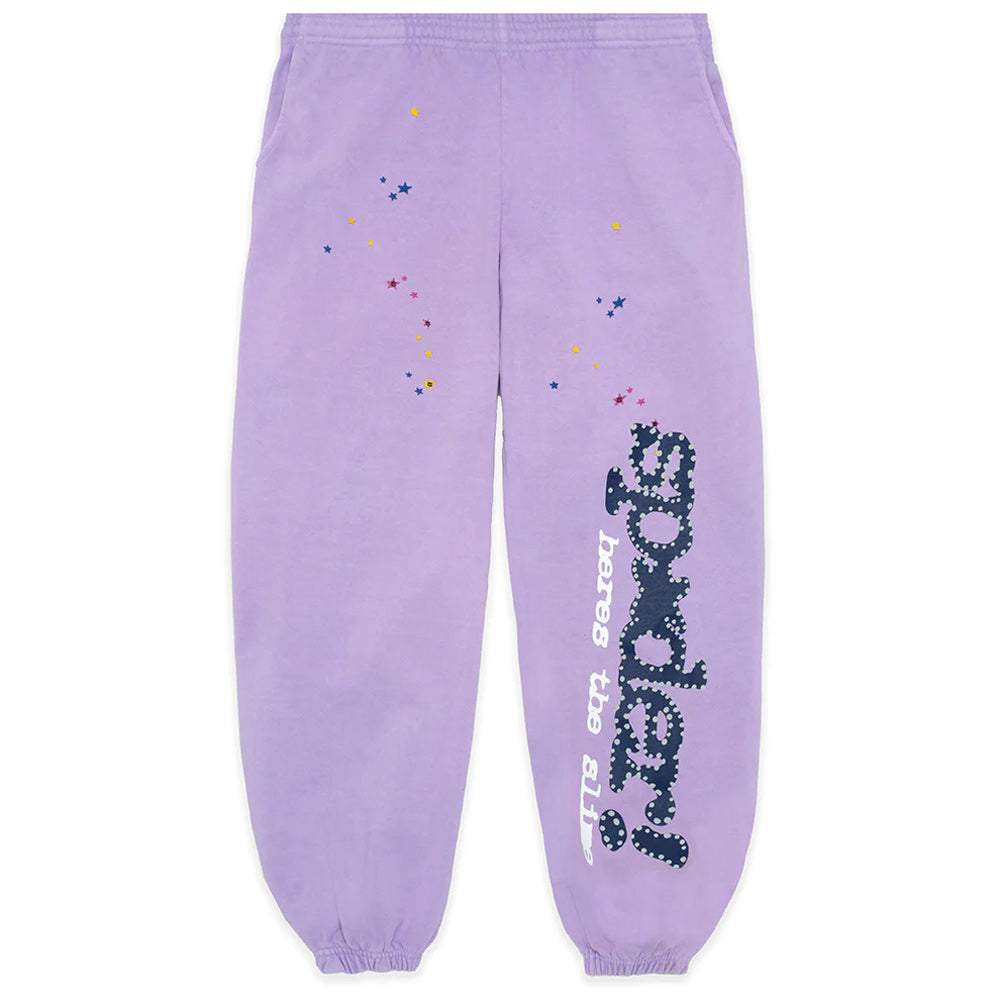 Purple sweatpants with text and star designs on a white background