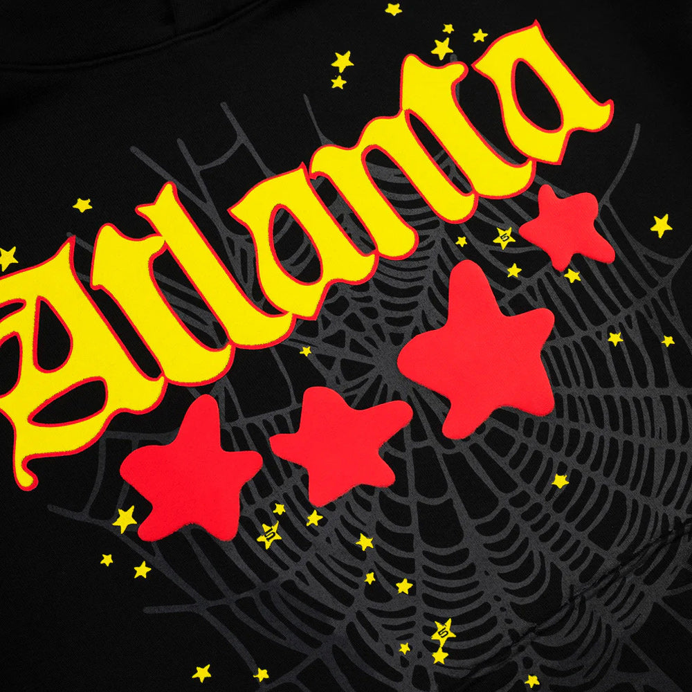 Black hoodie with 'Atlanta' in yellow, red stars, and spider web design.