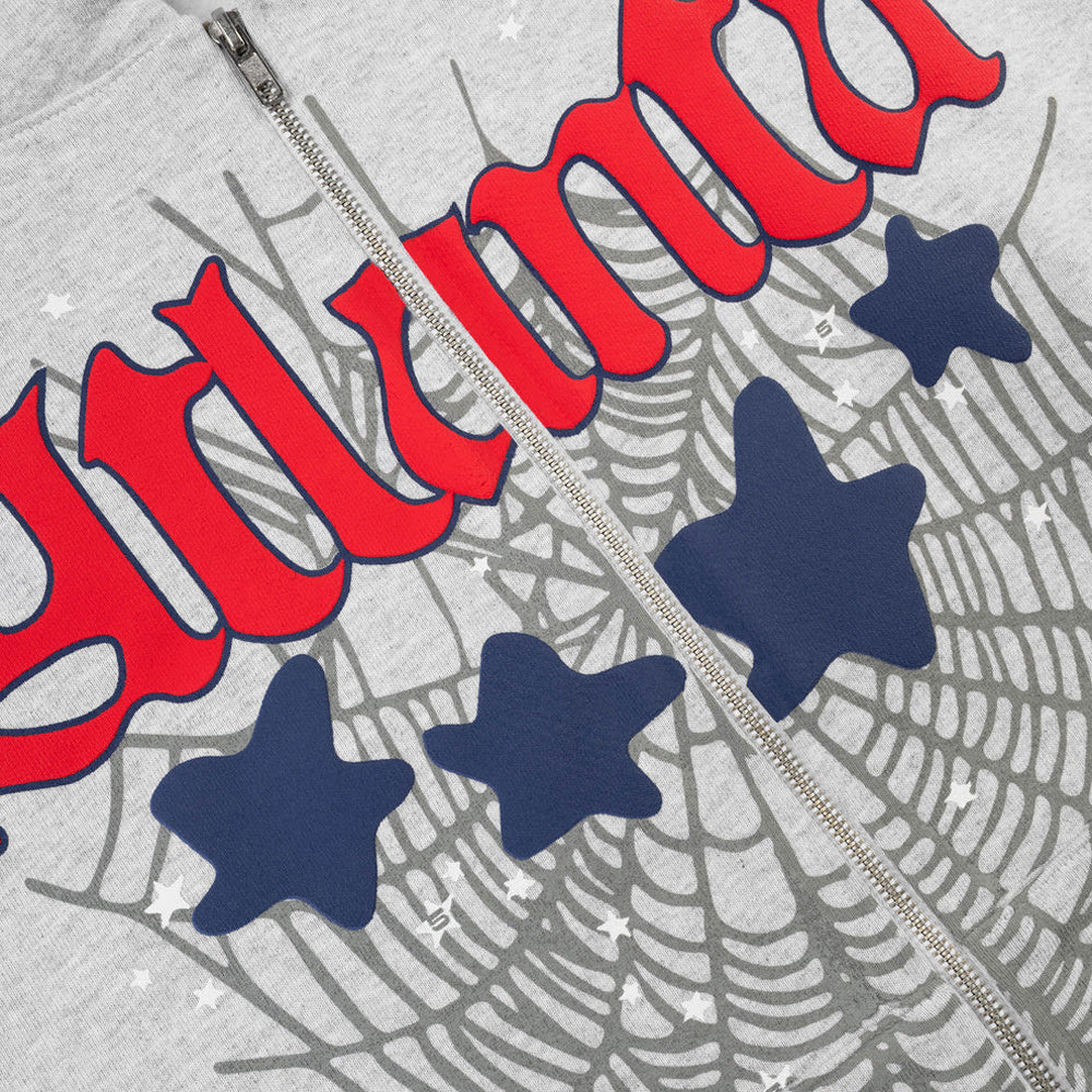 Gray sweatshirt with red text and blue stars on a textured background